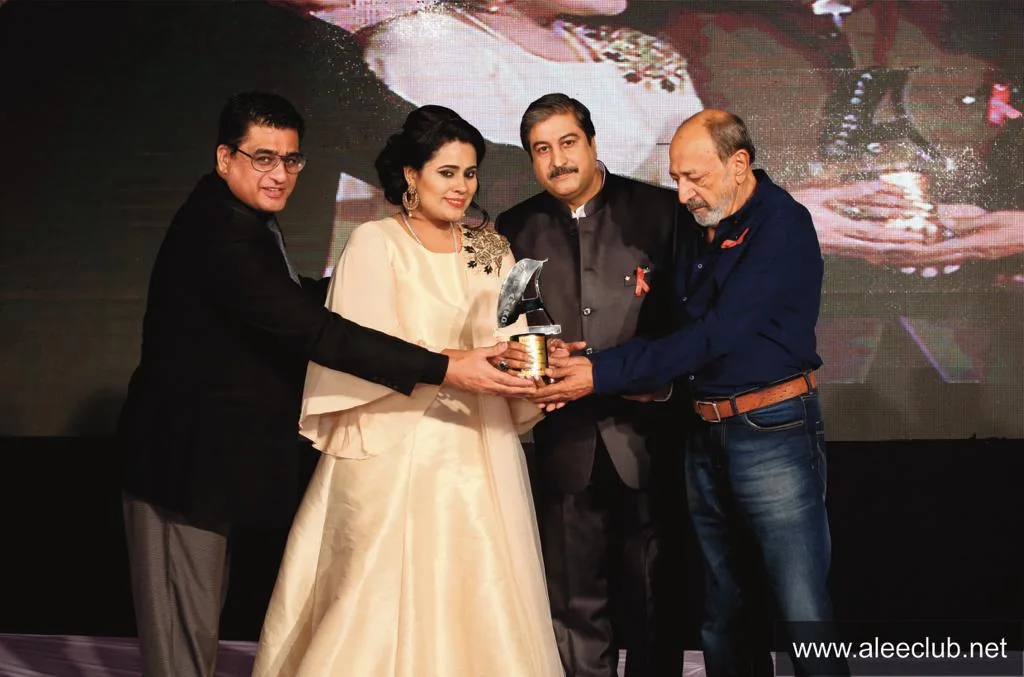 An award presentation at a formal event.