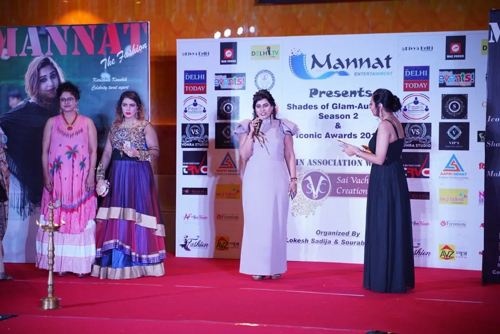 Dr. Neetti Katyal at an event with attendees.