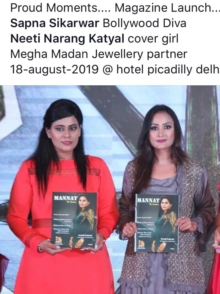 Dr. Neetti Katyal with a magazine at an event.